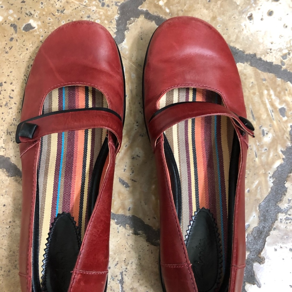 Clark’s black and red leather baby doll flats